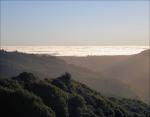 Above the clouds - looking down toward John Muir National Forest near Santa Cruz, CA