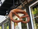 Carved wood pretzel sign, Cowichan Bay storefront, Vancouver Island, B.C.